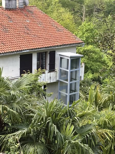 Ascenseur vitré sur 3 niveaux - site belairautonomie.fr
